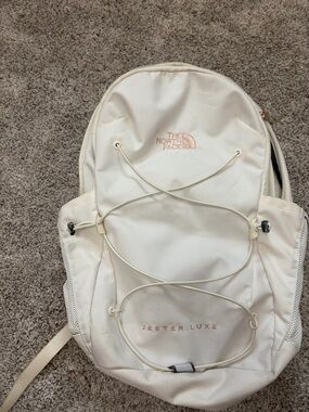 The North Face Cream Jester Luxe Backpack with Rose Gold Logo